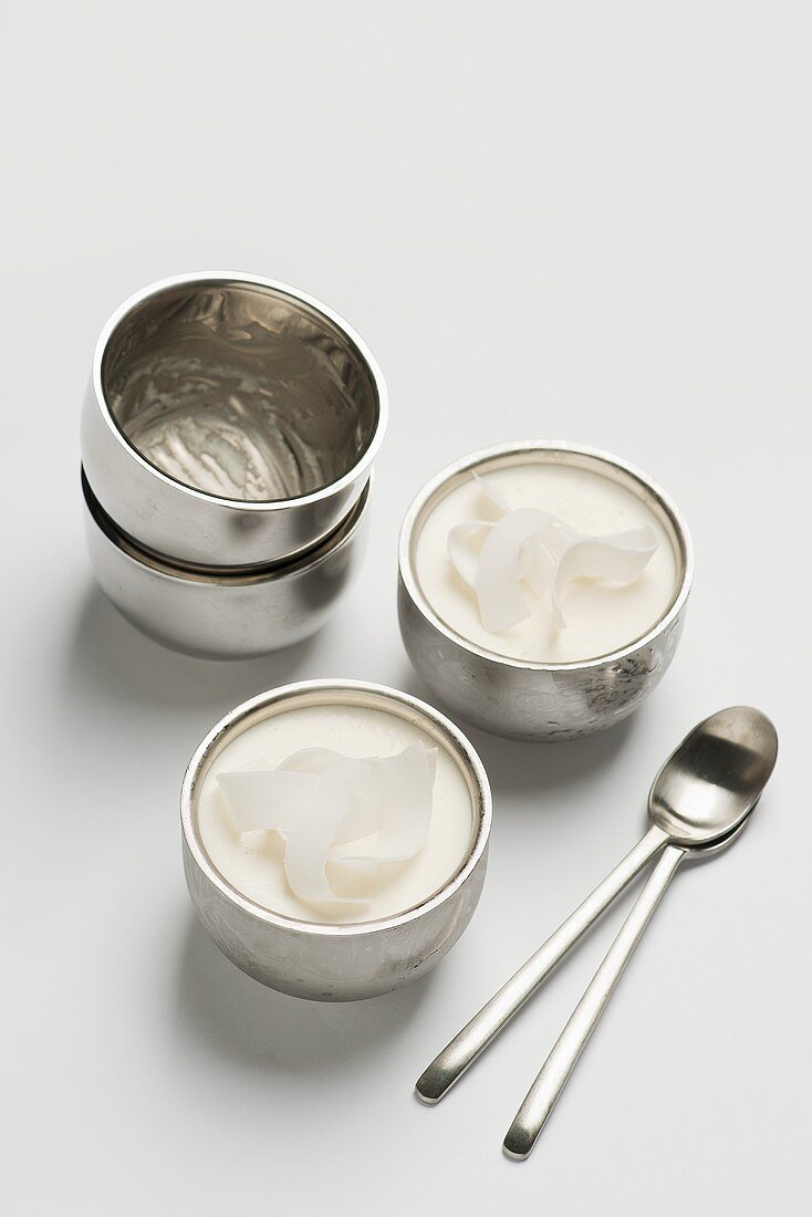 Coconut mousse in metal bowls