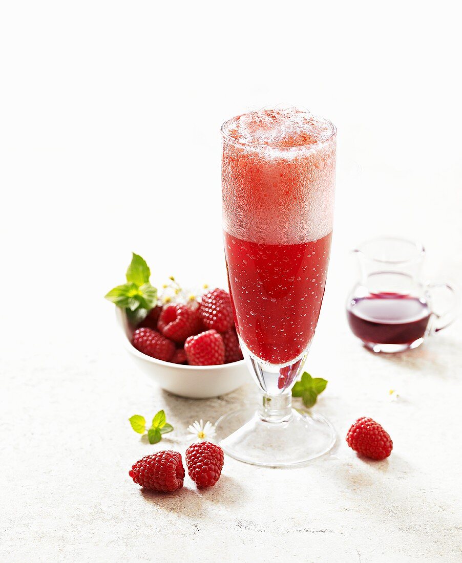 Champagne cocktail with raspberries