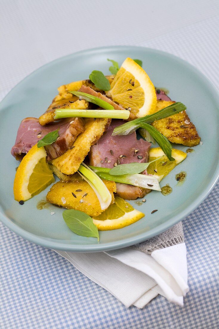 Duck with orange and fried polenta