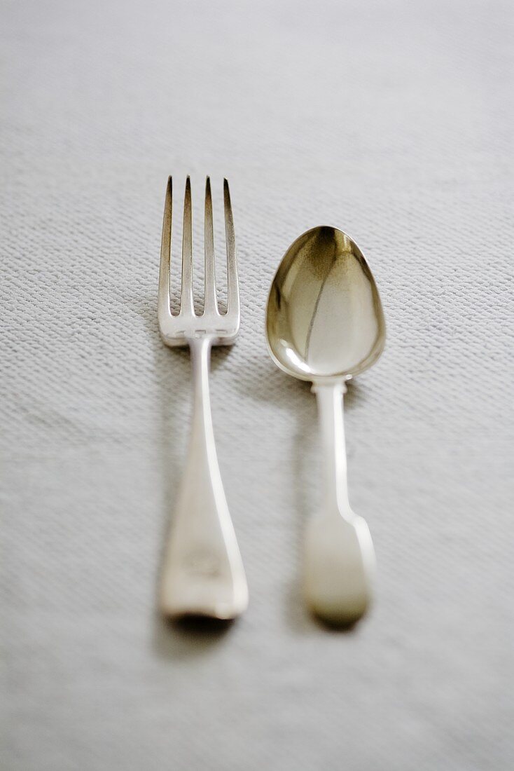 Antique silver cutlery (fork and spoon)