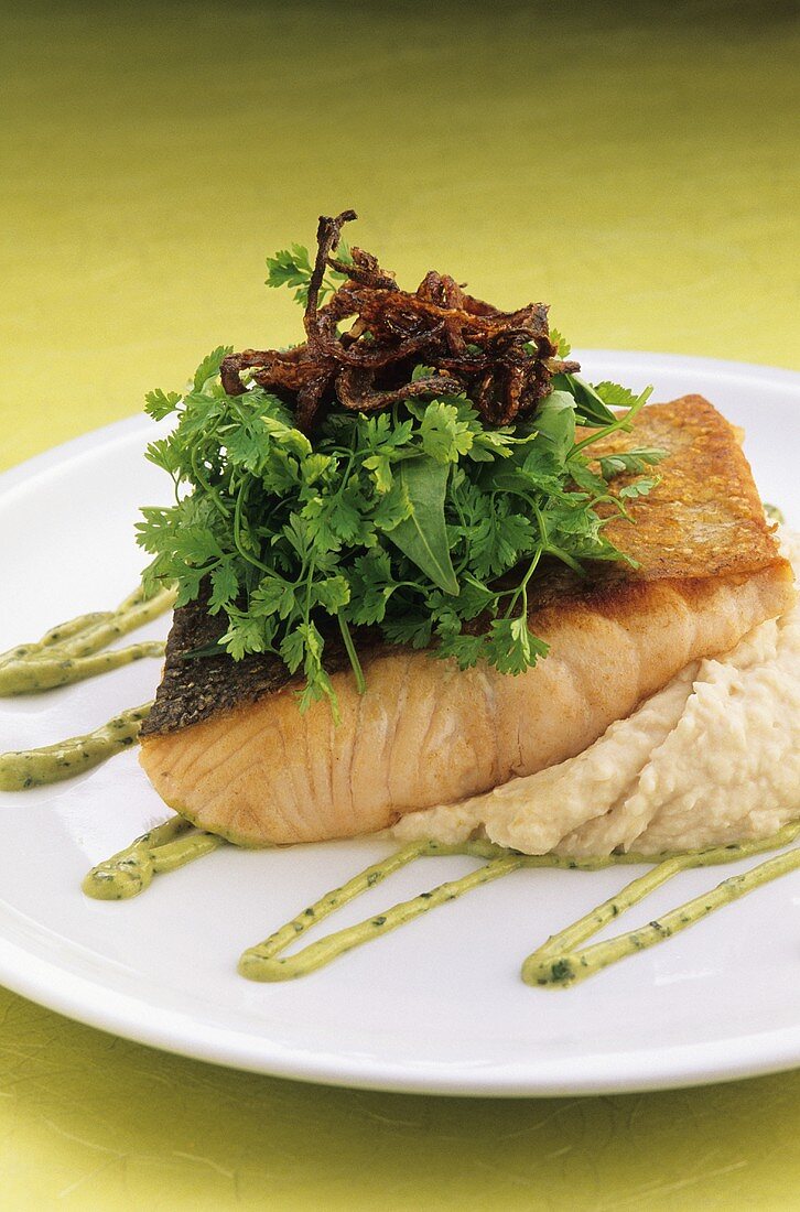 Salmon fillet on puree with fresh herbs