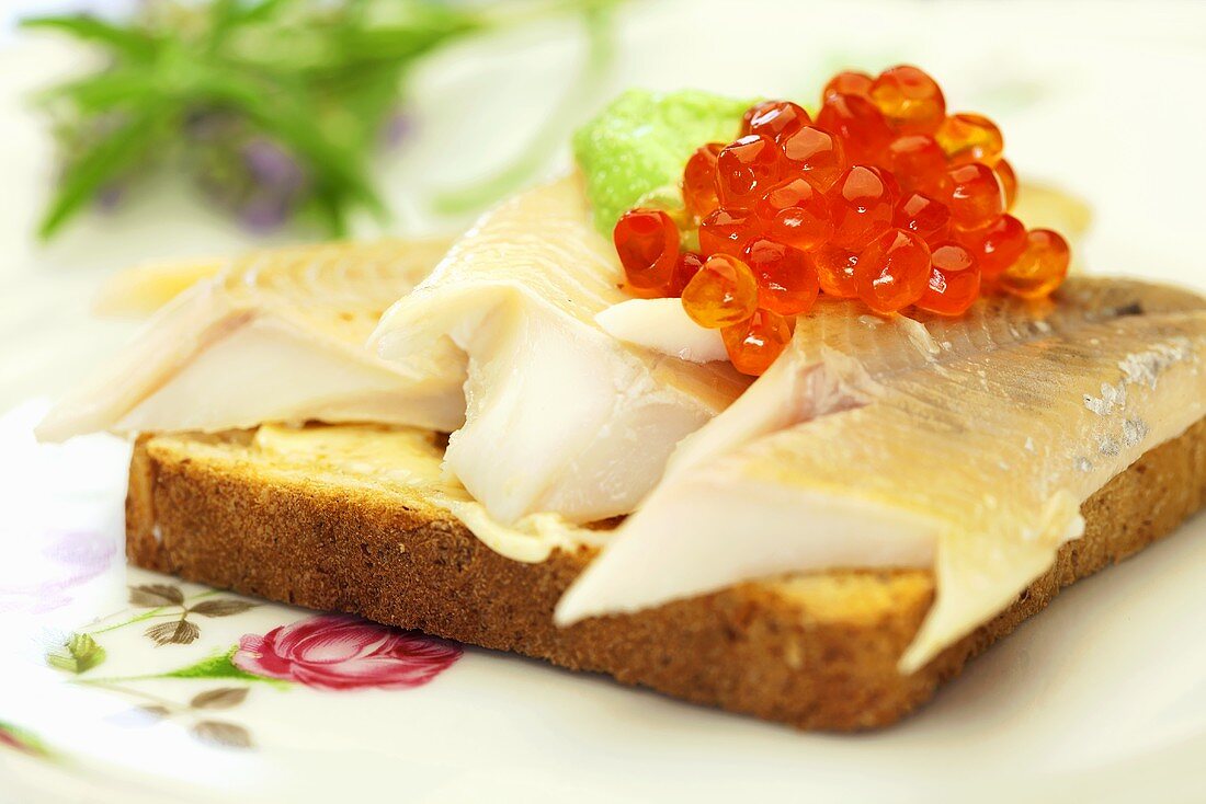Toast with trout fillet and caviar