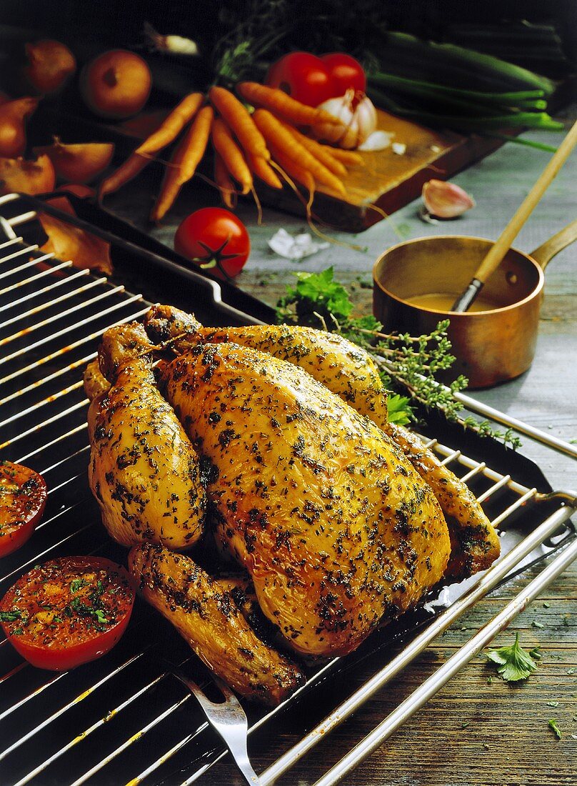 Herb roast chicken with grilled tomatoes