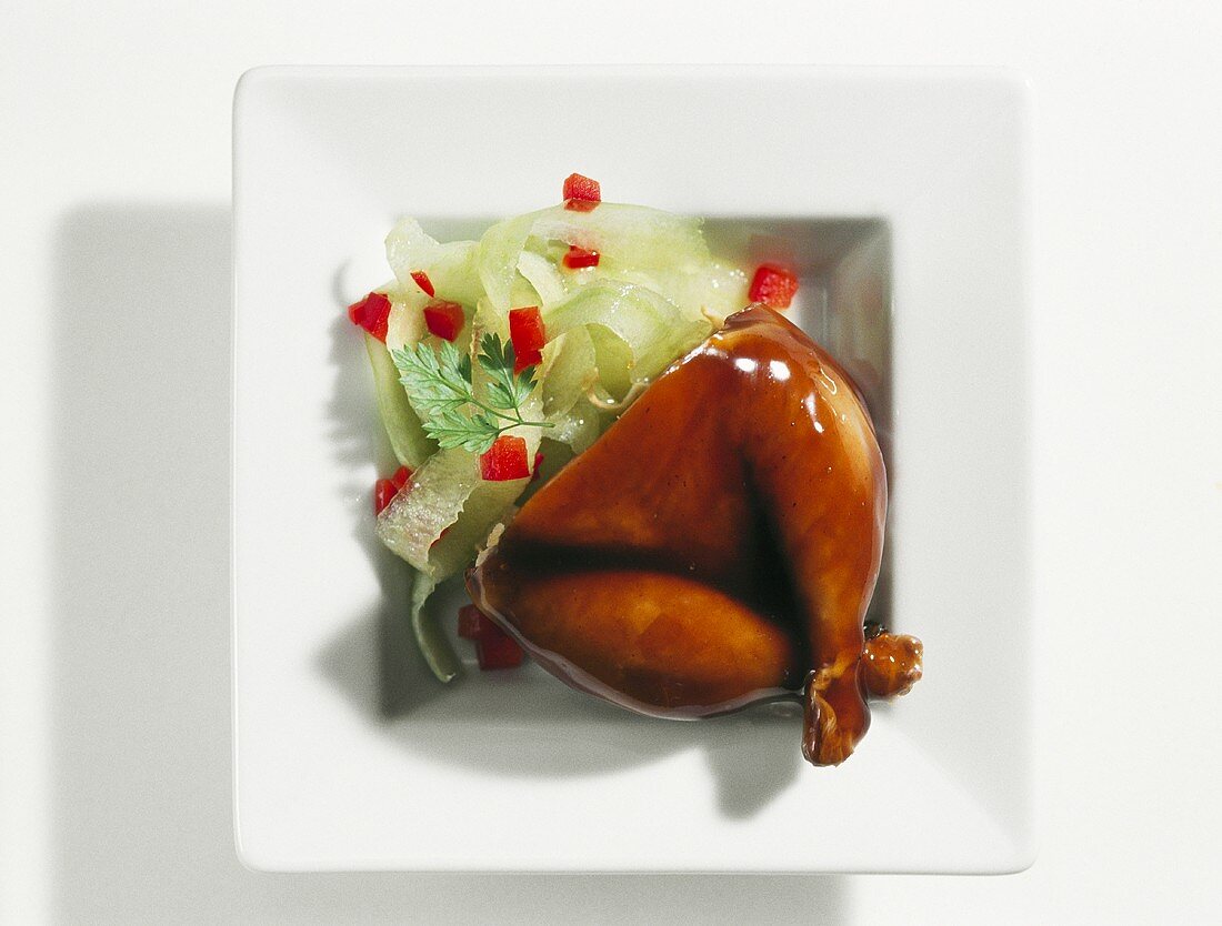 Quail galantine filled with goose liver and served with a cucumber salad