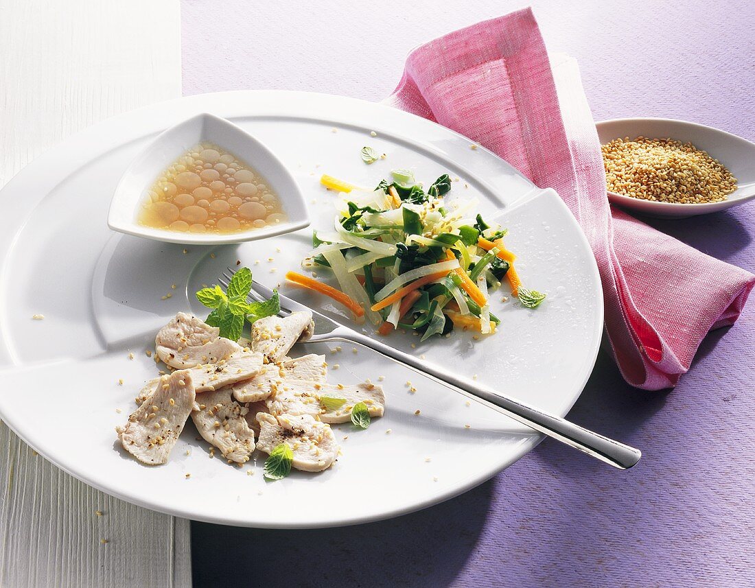 Steamed chicken breast with vegetables, sesame and vinaigrette