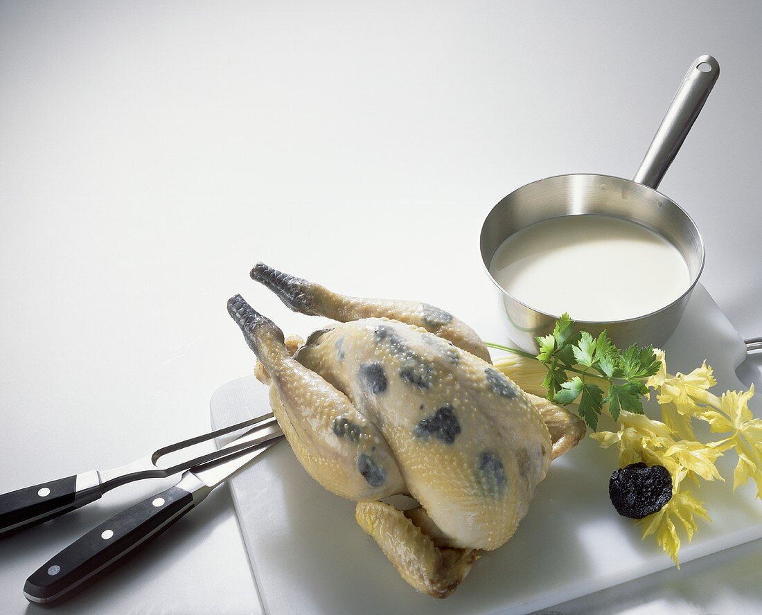 Guinea fowl with sliced truffles under the skin
