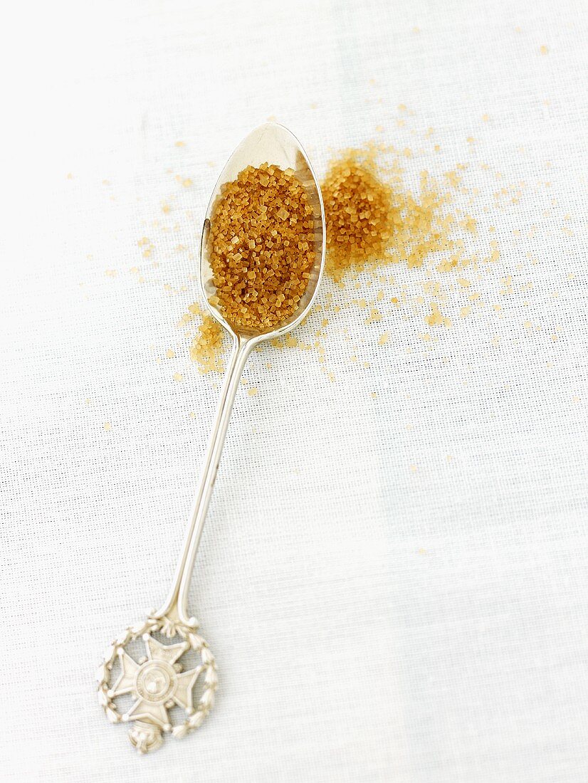 Demerara sugar on silver spoon