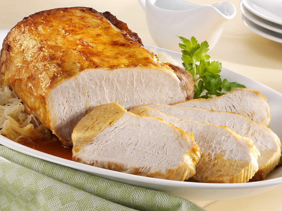 Roast pork with gravy and sauerkraut