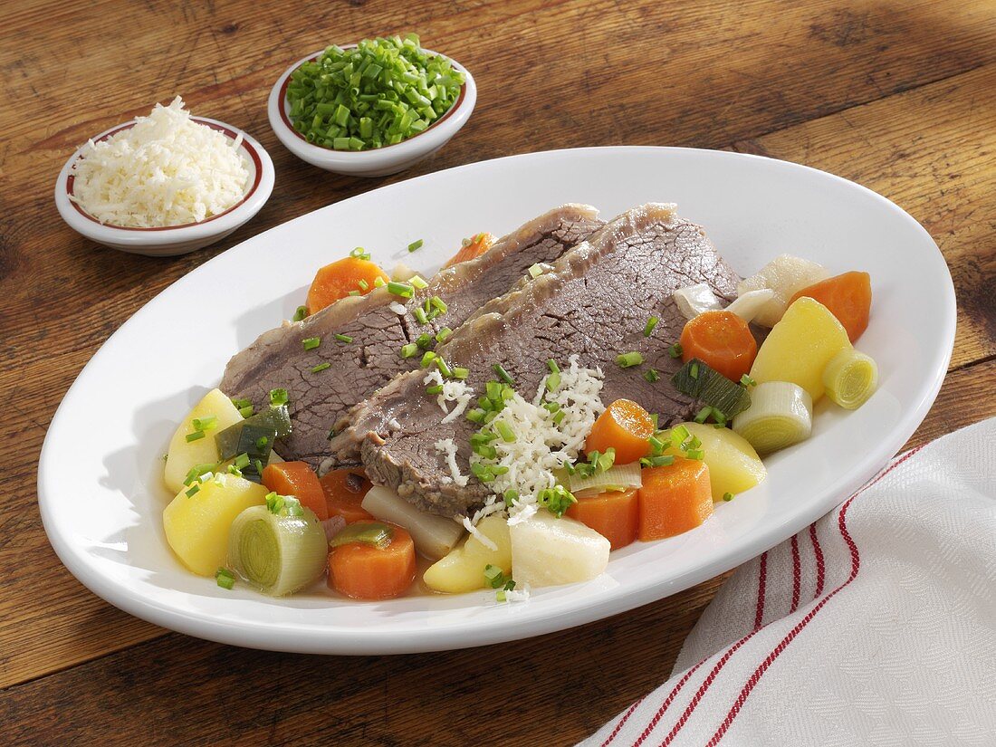 Boiled beef with vegetables, horseradish and chives