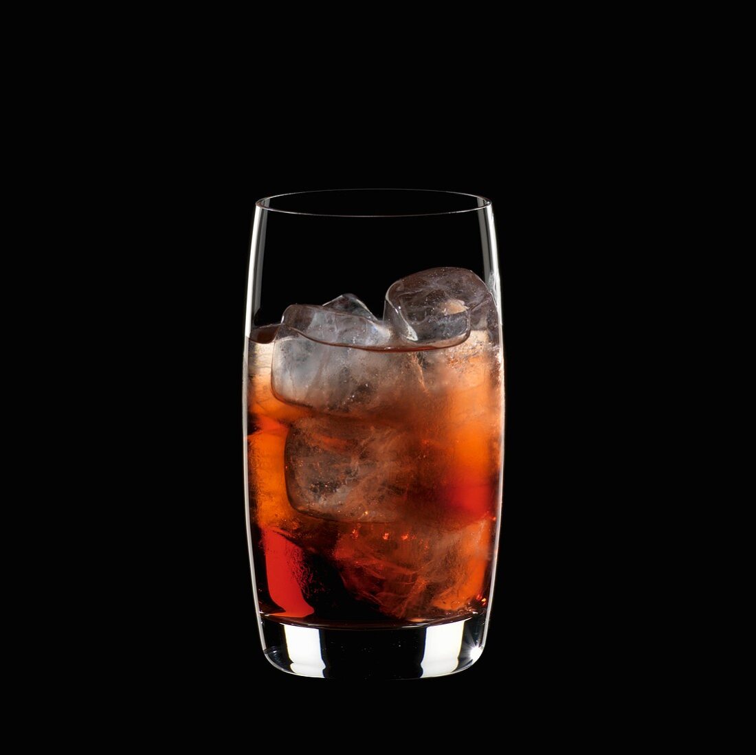 A glass of Campari Soda with ice cubes