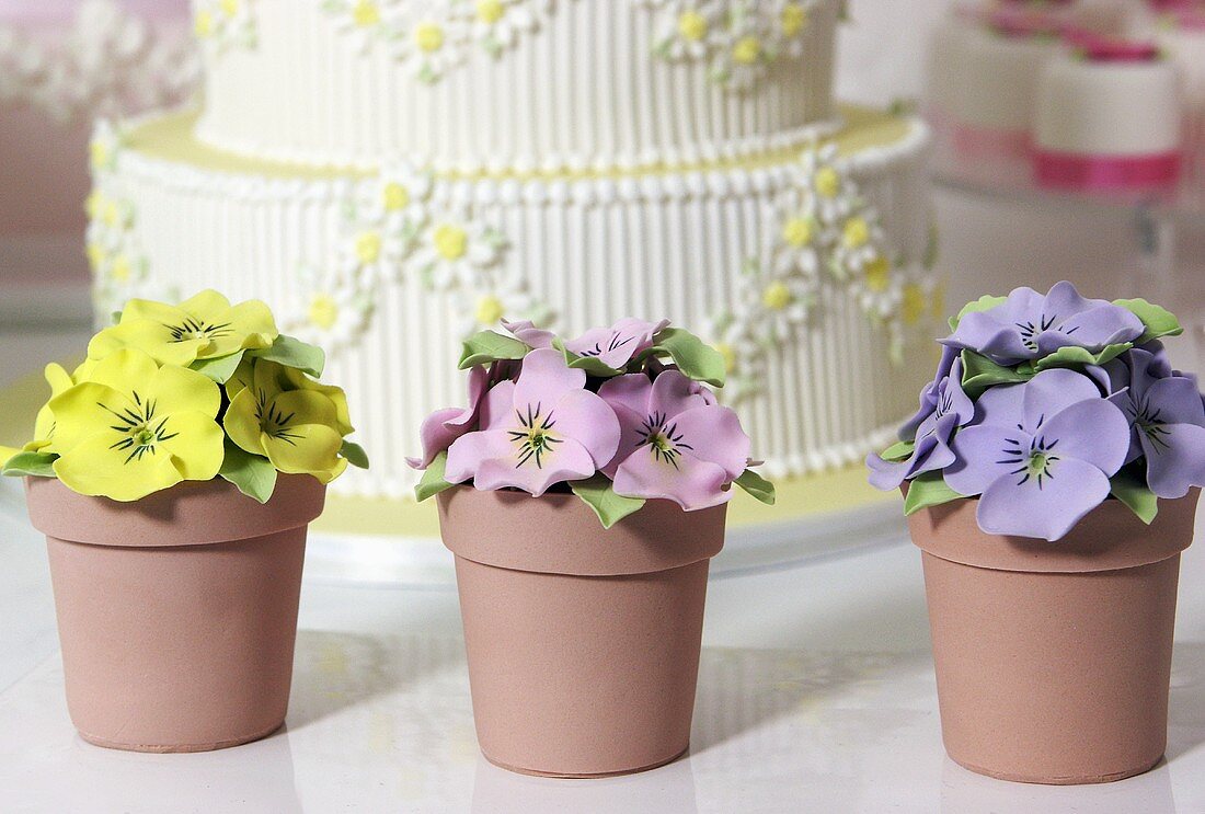 Wedding cake and artificial pansies