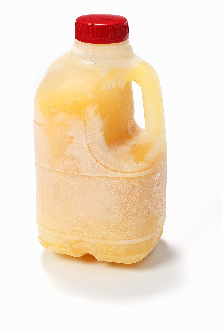 Orange juice (frozen) in plastic bottle