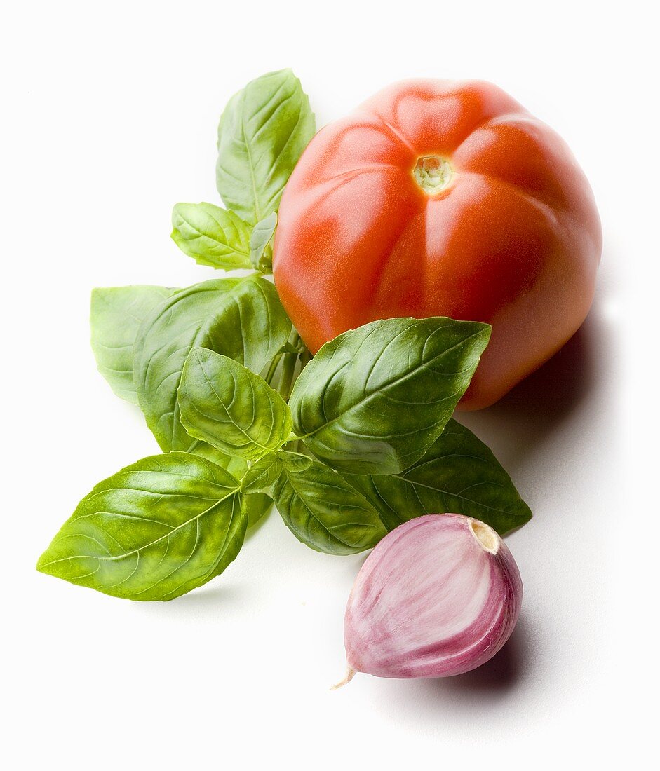 Tomato, basil and garlic clove