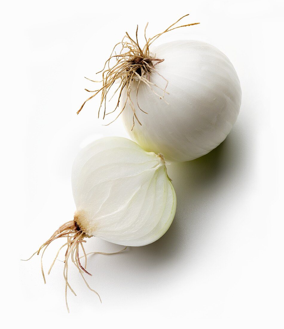 Whole white onion and half an onion