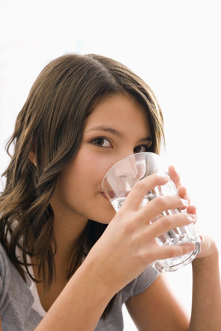 Girl drinking a glass of water