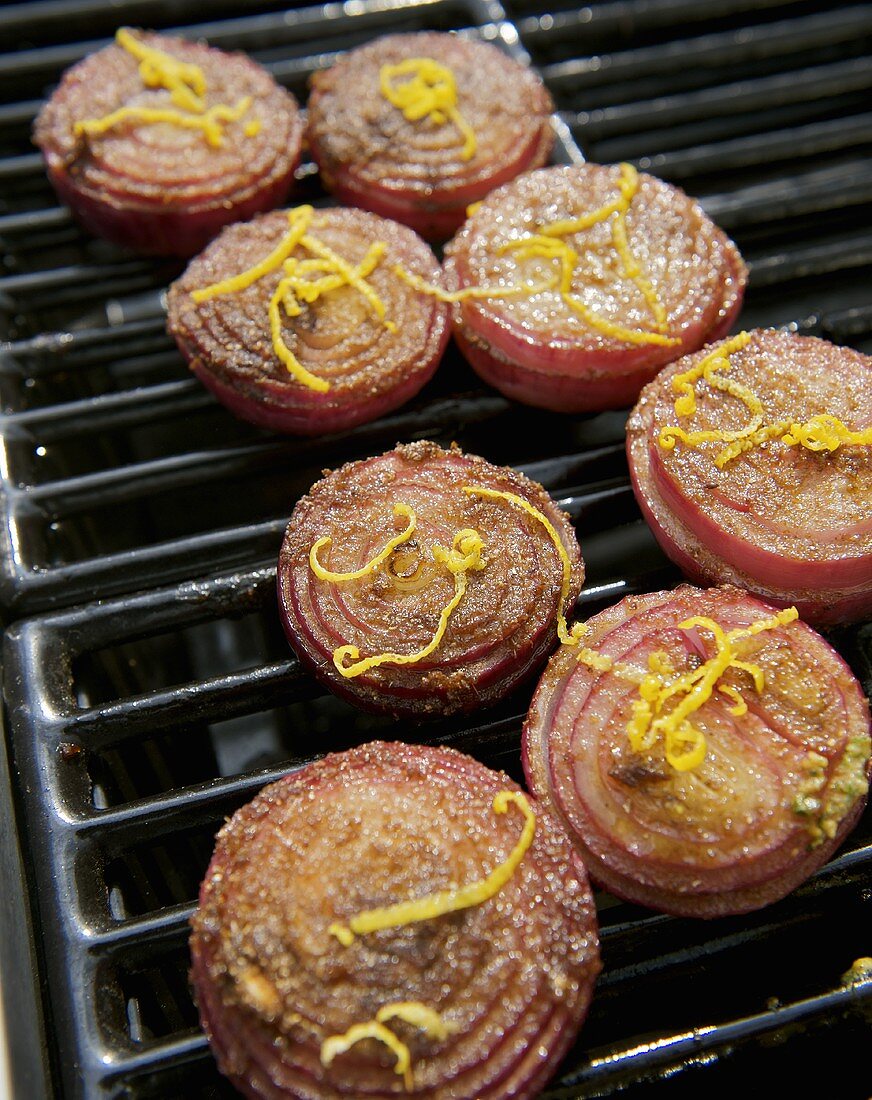 Marinated red onions on a barbecue