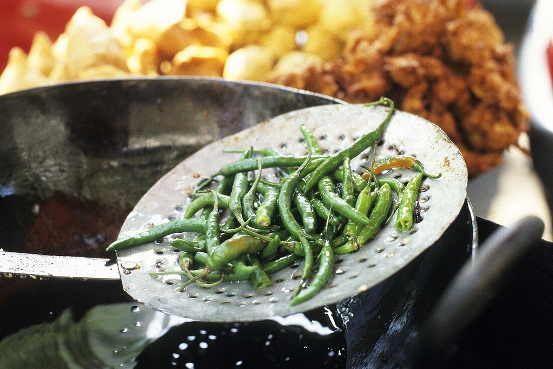 Beans being cooked in an Indian cookshop