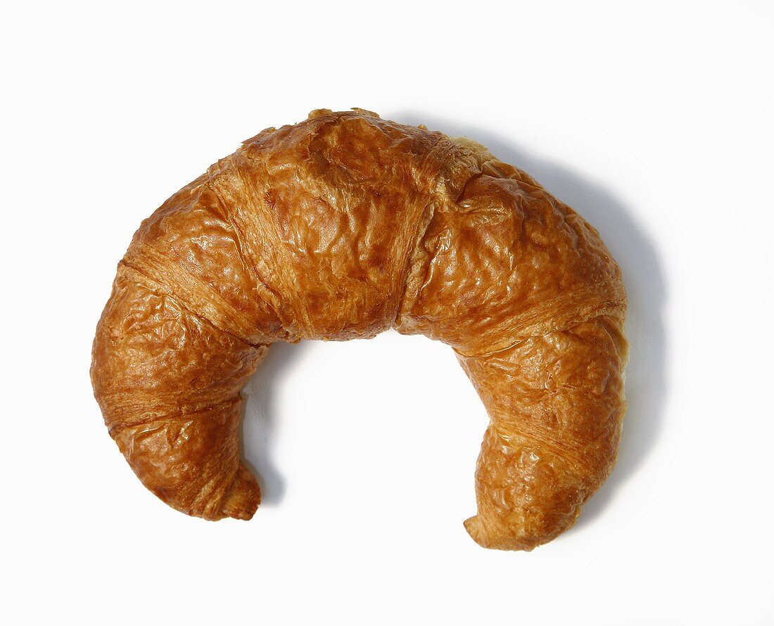 Croissant on White Cloth 