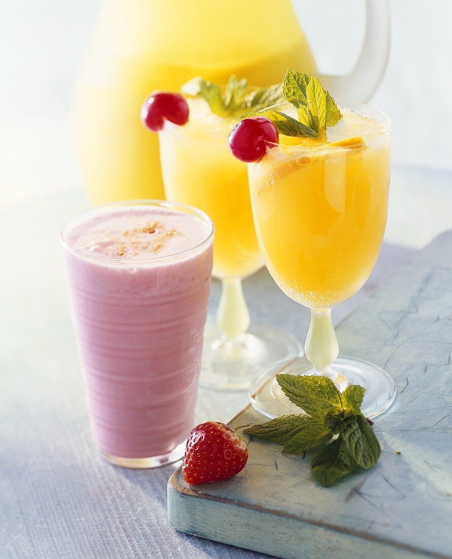 Strawberry milk shake and orange cocktails