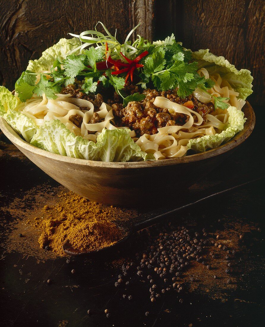 Rice noodles with a minced meat sauce and coriander (Thailand)