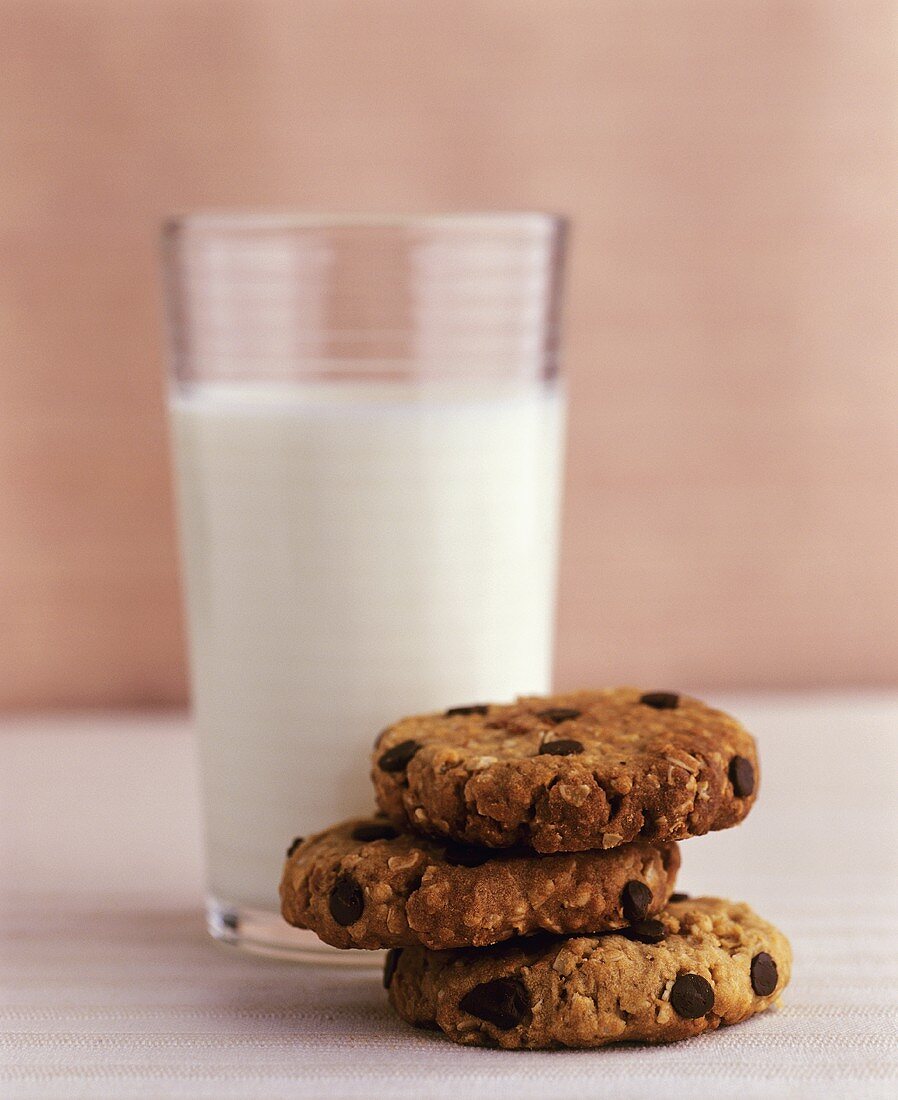 Chocolate chip oat biscuits and a glass of milk
