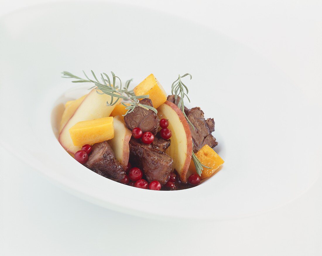 Braised shoulder of venison with cranberries & sweet potatoes
