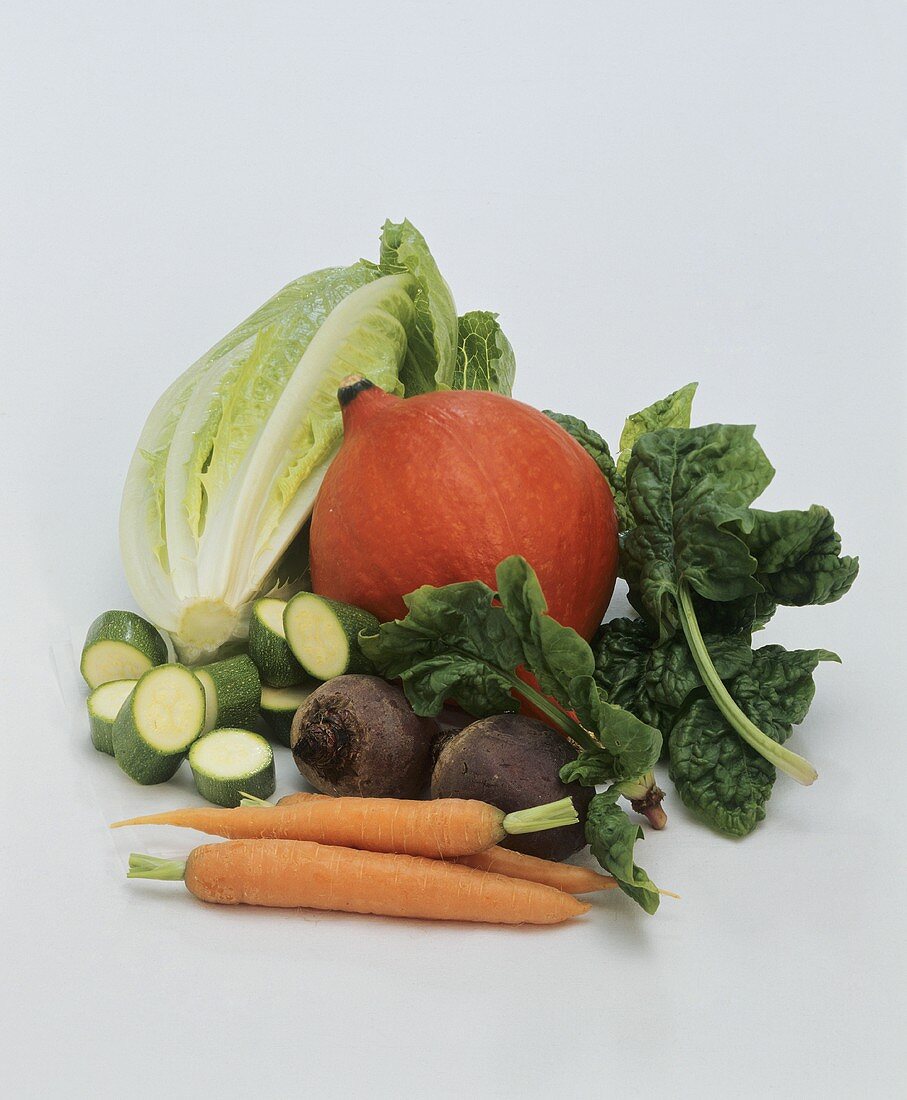 Vegetable still life against white background