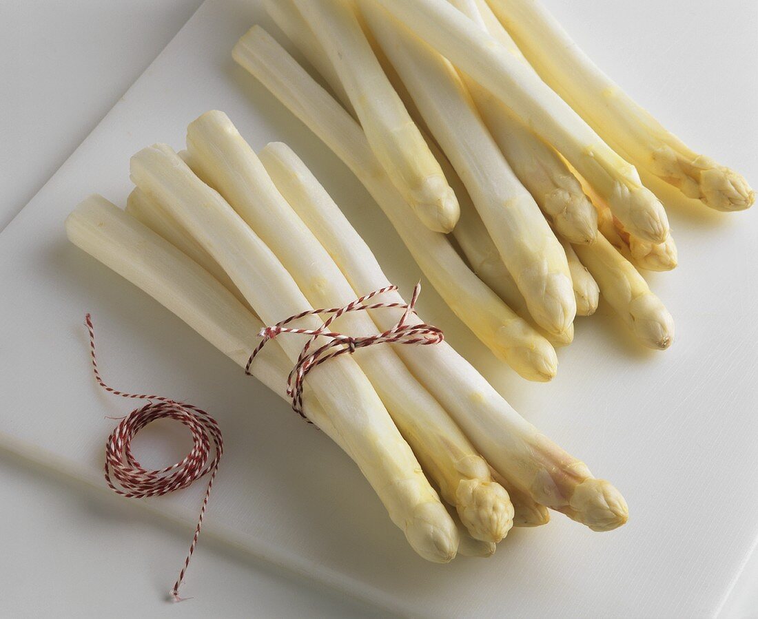 Bundles of peeled asparagus ready for cooking