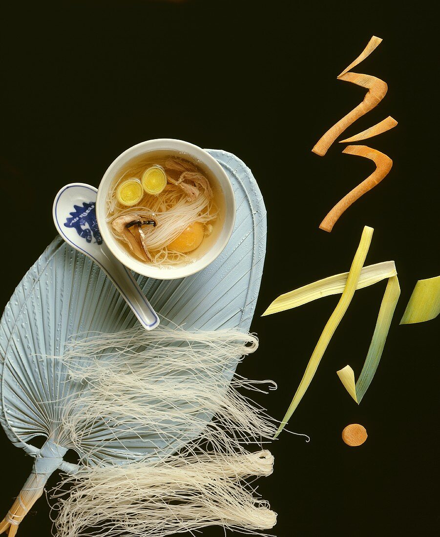 Asian soup with glass noodles and egg