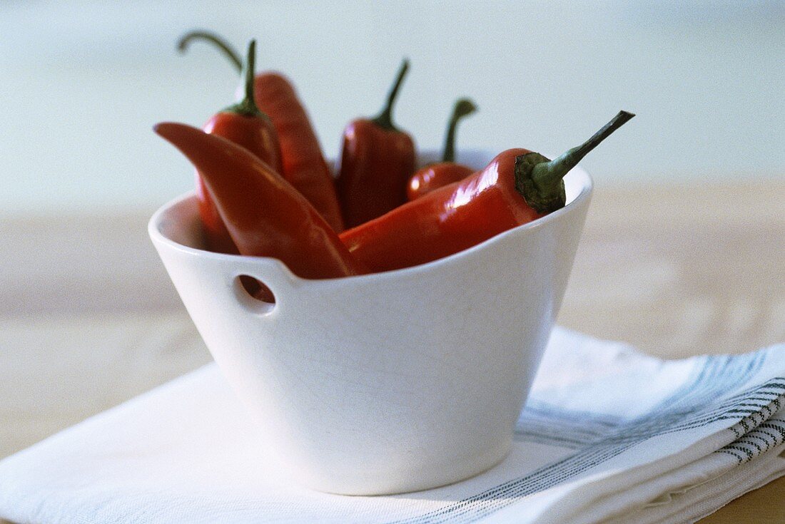 Red chillies in a white dish