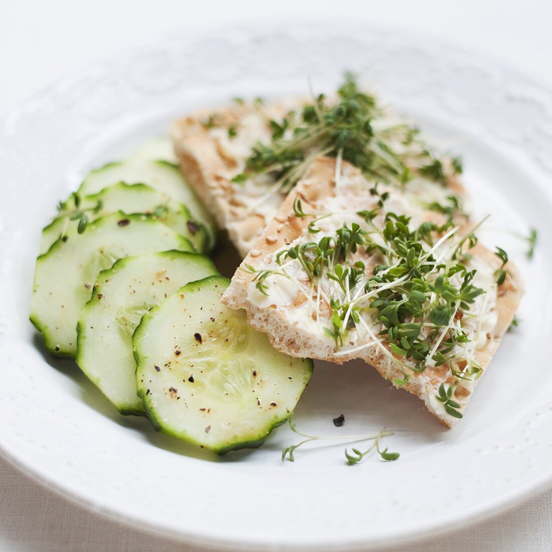 Crispbread with cress and cucumber slices