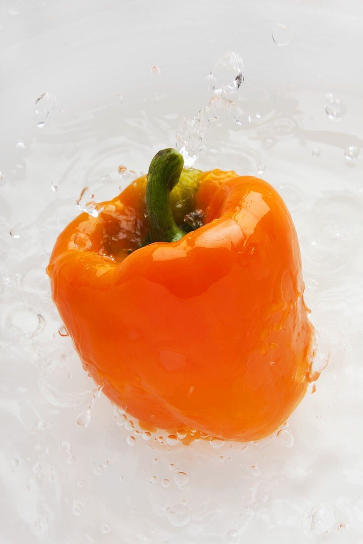 Orange pepper in water