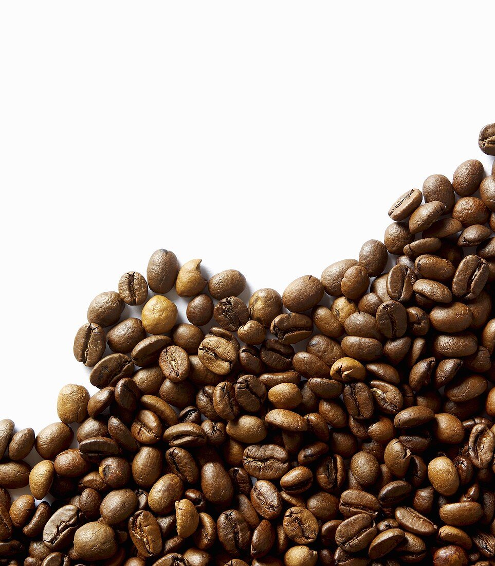 Coffee beans against white background
