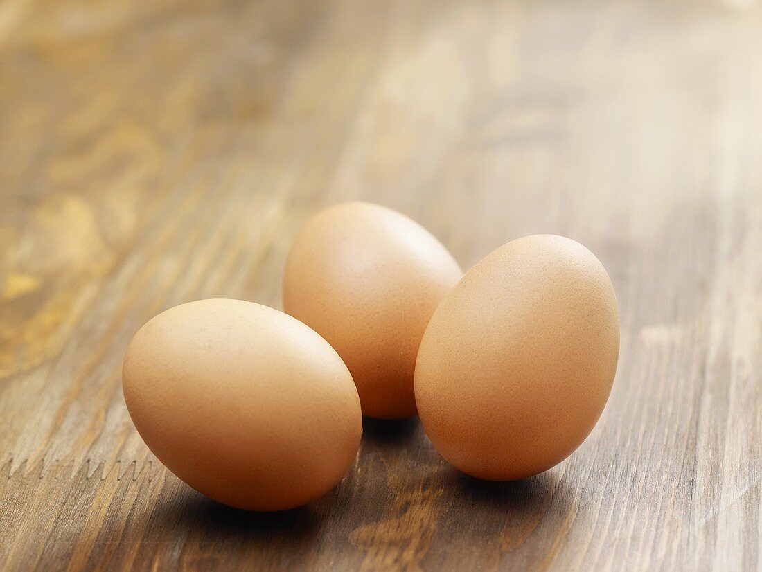 Three brown eggs