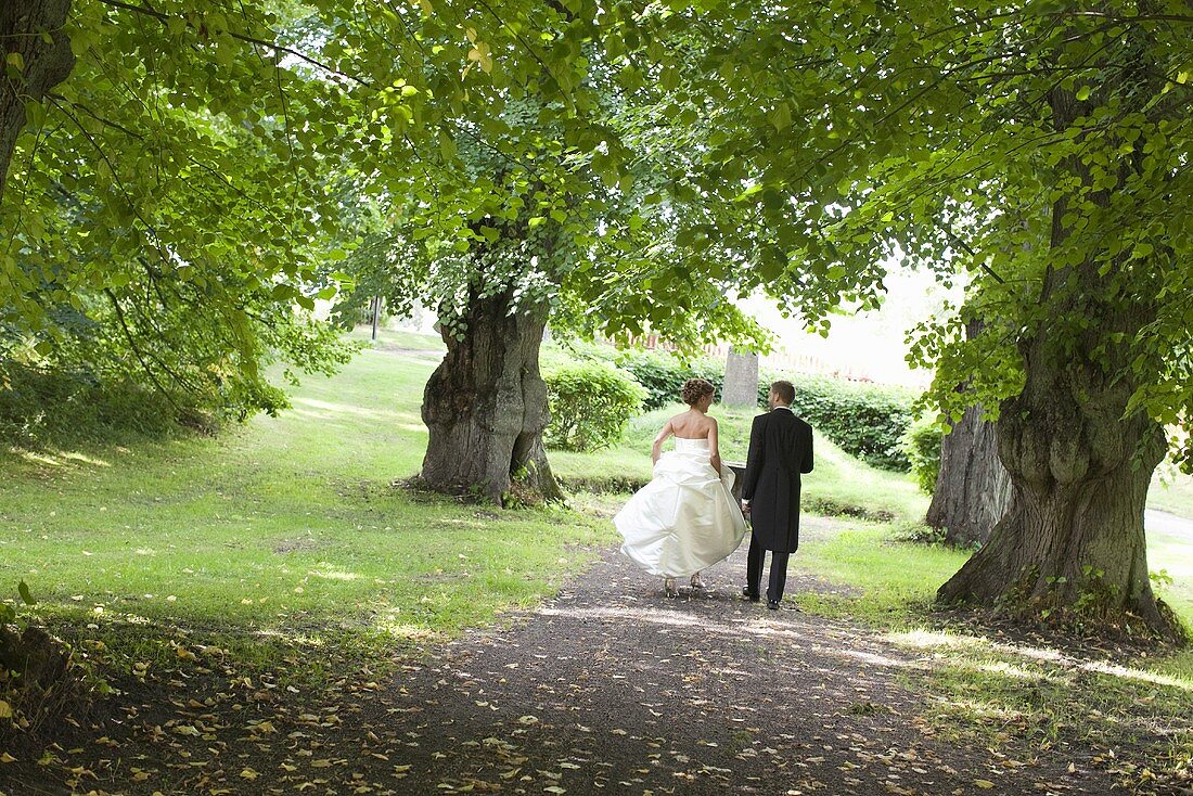 Bride and groom in a park