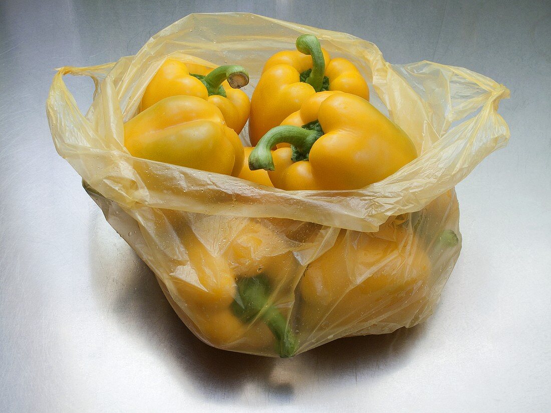 Yellow peppers in a plastic bag