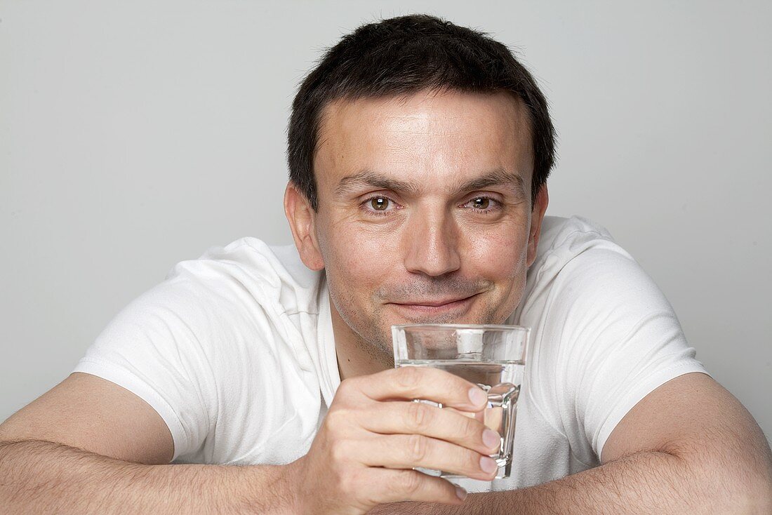 Man holding glass of water