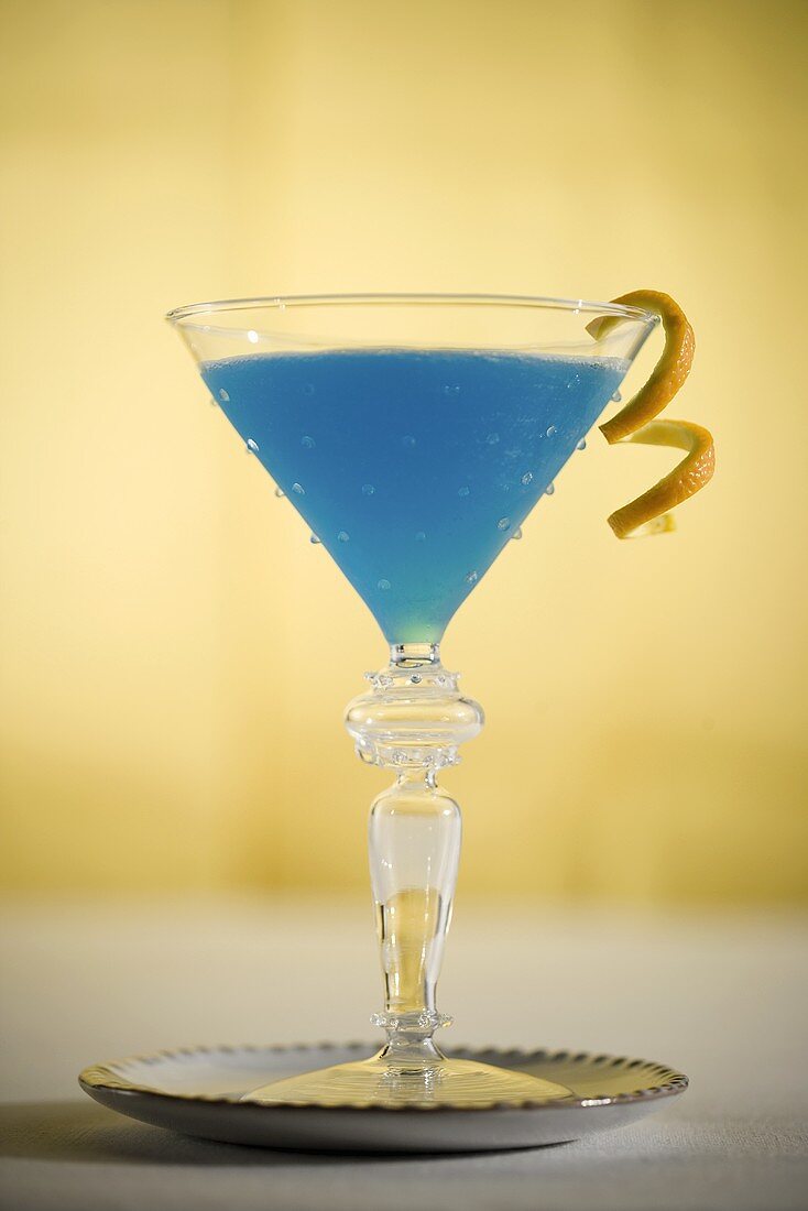 Blue Cocktail with Citrus Garnish