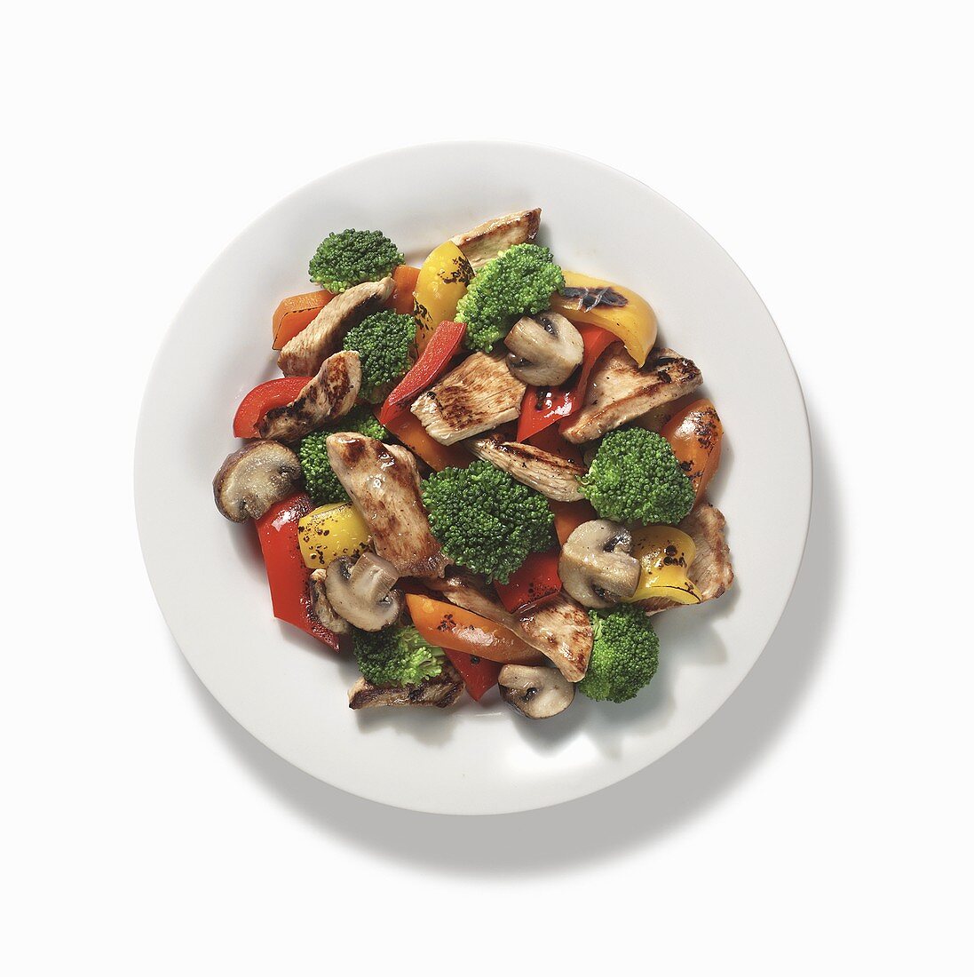 Chicken and Vegetables on a White Plate