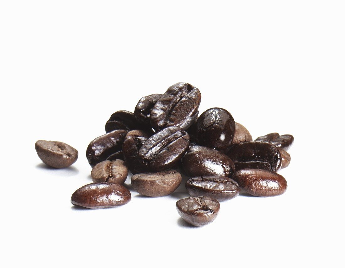 Pile of Coffee Beans on White Background