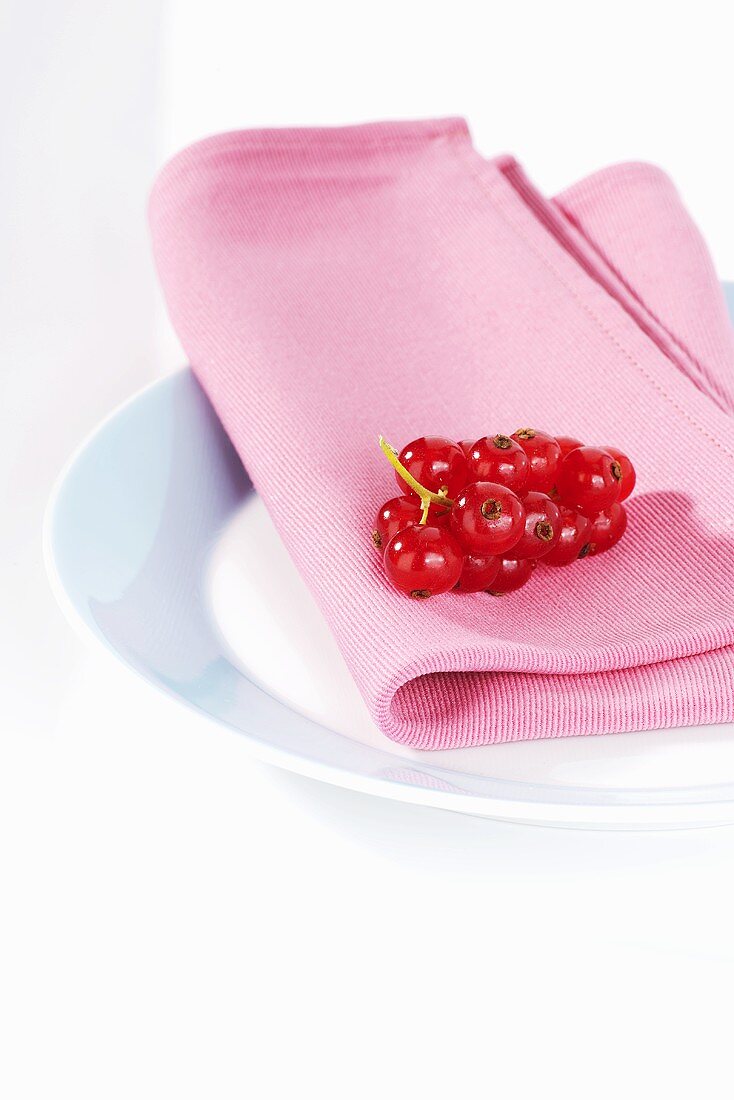 Redcurrants on fabric napkin