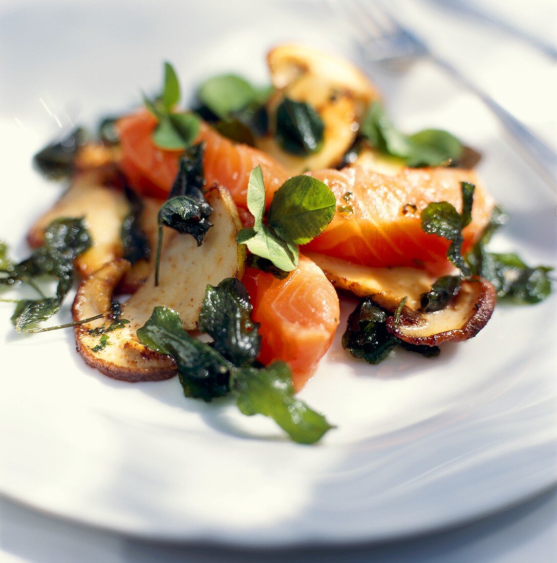 Salmon with fried cep mushrooms and clover
