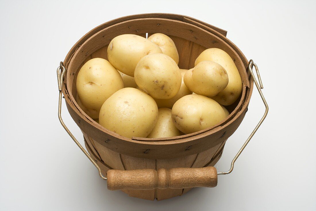 Potatoes in woodchip basket