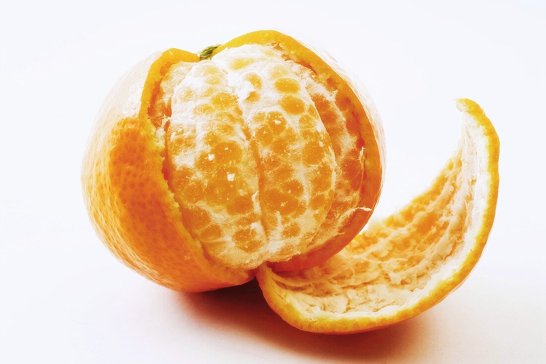 Half-peeled mandarin orange