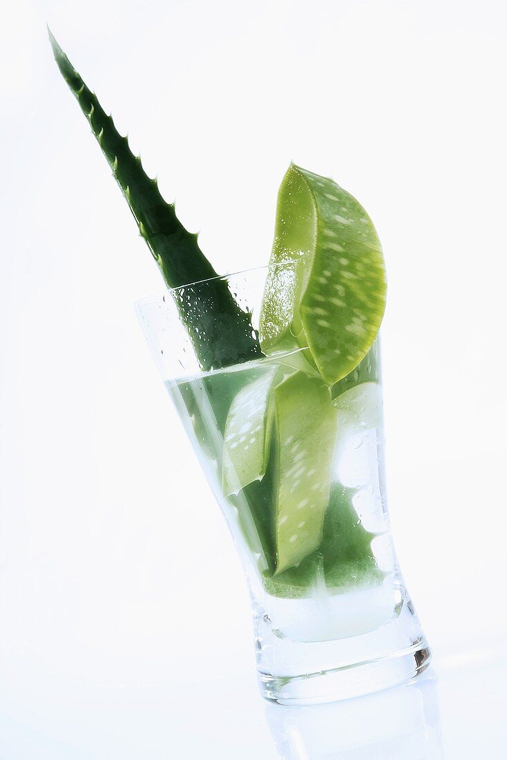 Aloe vera leaf with sap in glass
