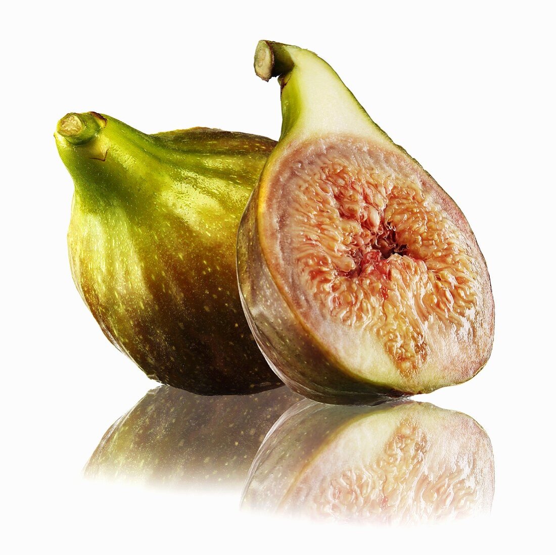 Whole fig and half a fig with reflection