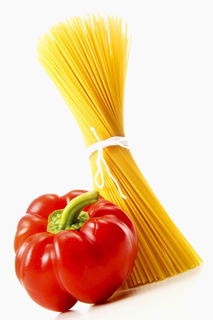 A bundle of spaghetti with red pepper