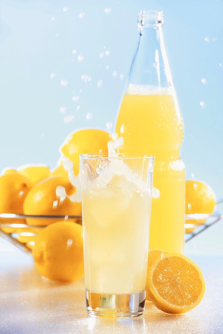 Lemonade in glass and bottle