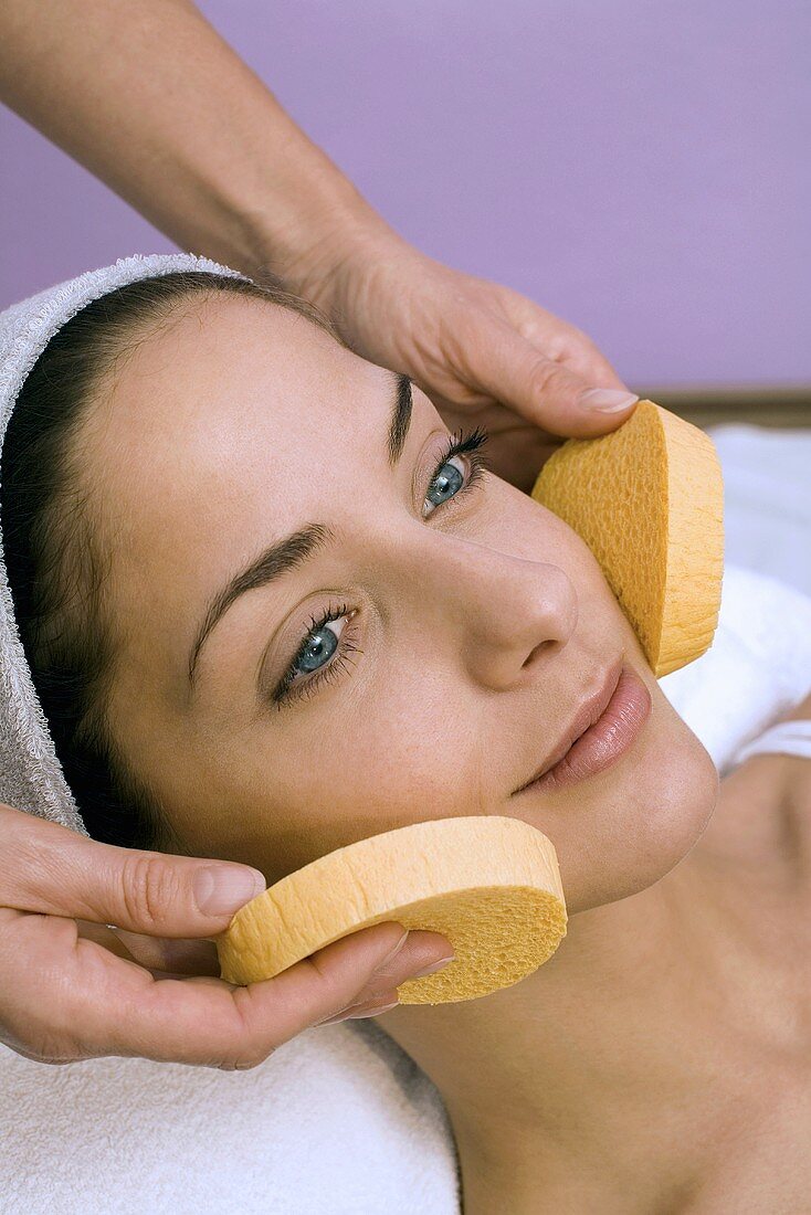 Young woman having cosmetic treatment