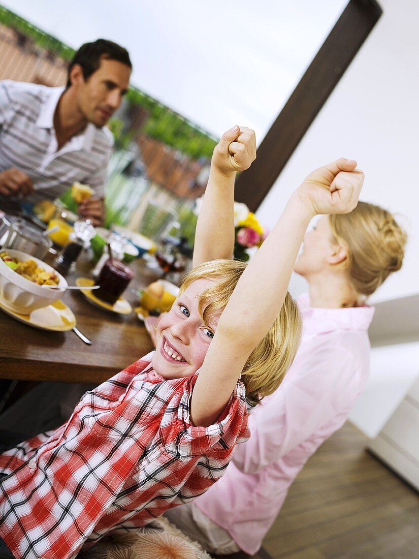 Family at breakfast table